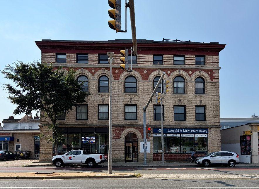 An Allston building with a row of arched windows
