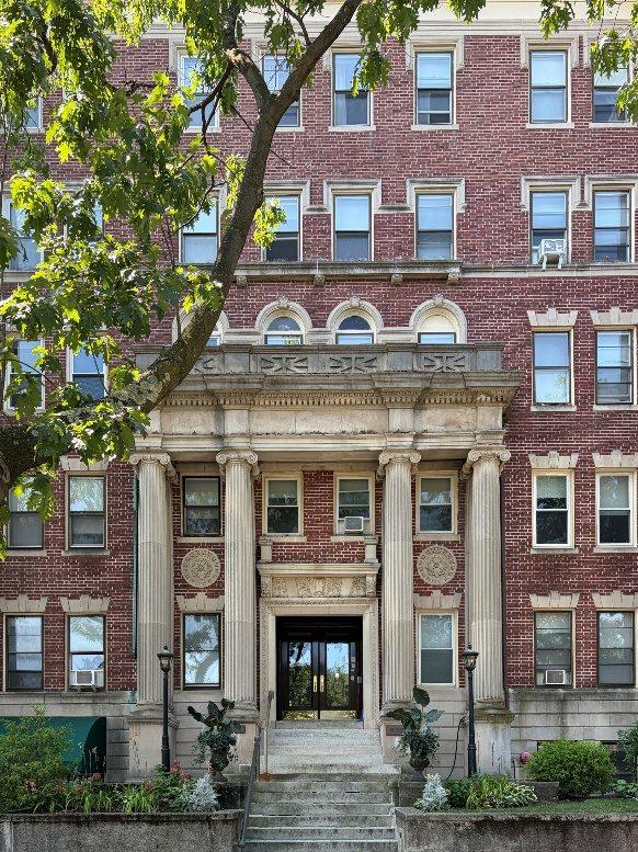 Columned entrance of an Allston apartment building